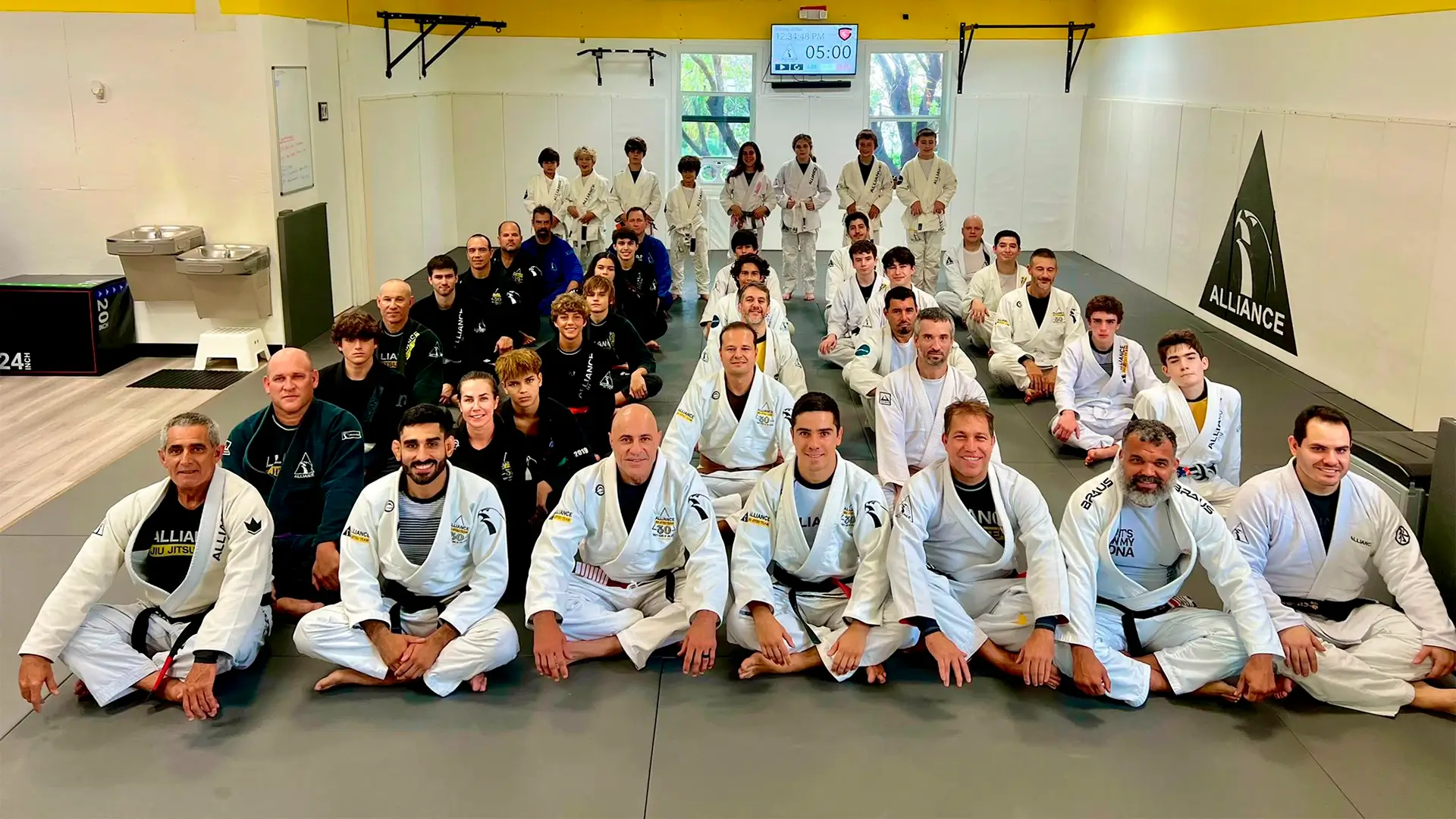 Alliance Jiu Jitsu Key Biscayne students and instructors together on the mat